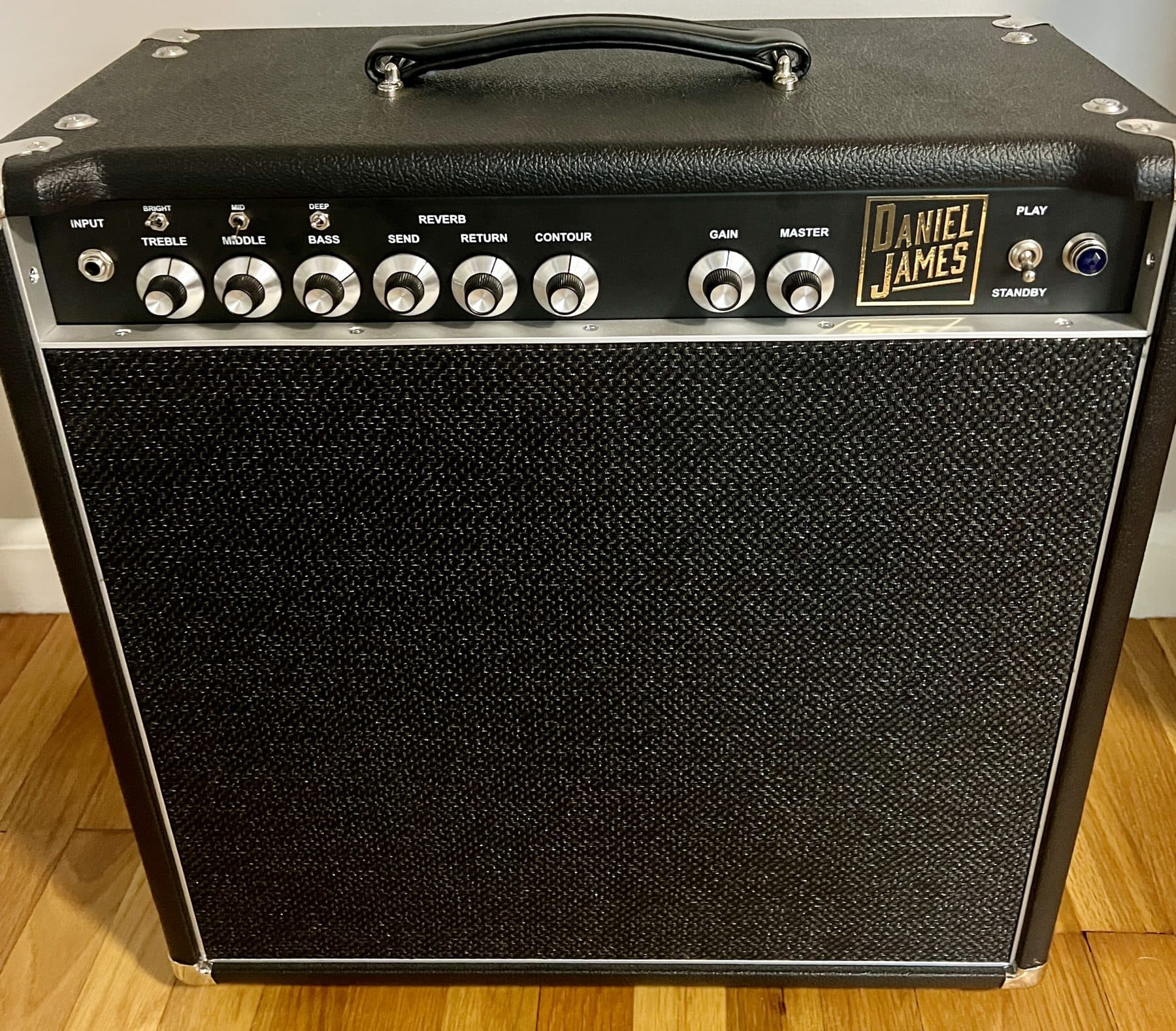 Black Daniel James combo amplifier with reverb and contour controls