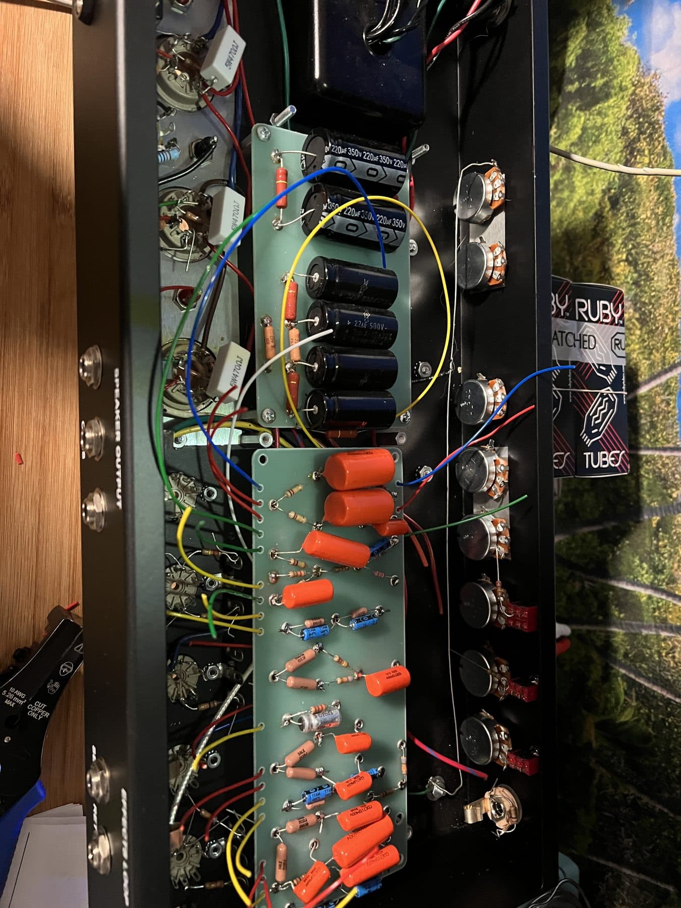 Board with orange film capacitors and 220 microfarad filter caps